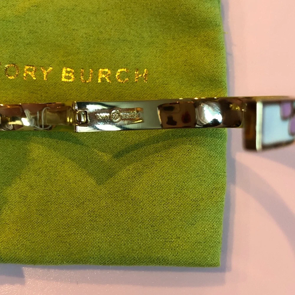 Authentic Tory Burch New/tag and pouch. Enamel Floral Hinge gold tone bracelet.